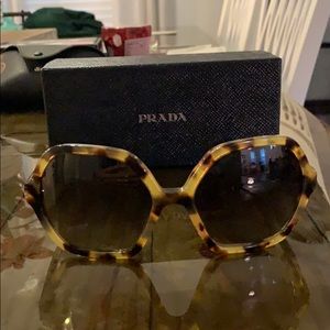Prada sunglasses. Large tortoise print brown lens.